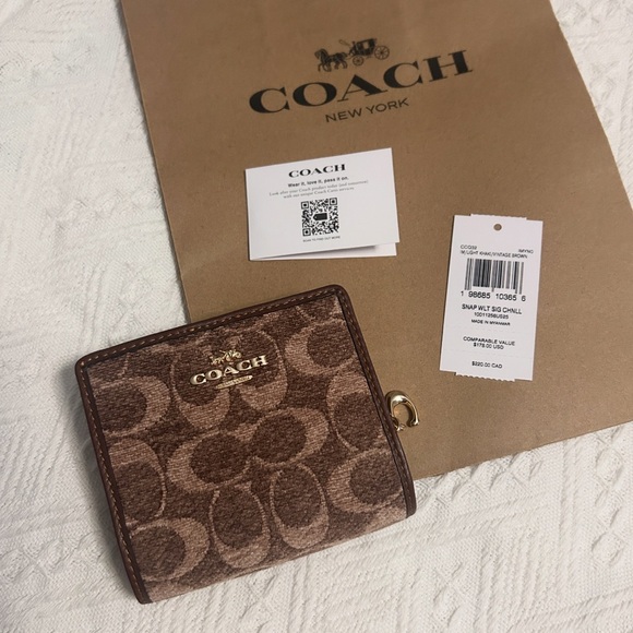 Coach Handbags - NWT!!👛Coach Snap Wallet
In Signature Chenille Brown Monogram CCQ32